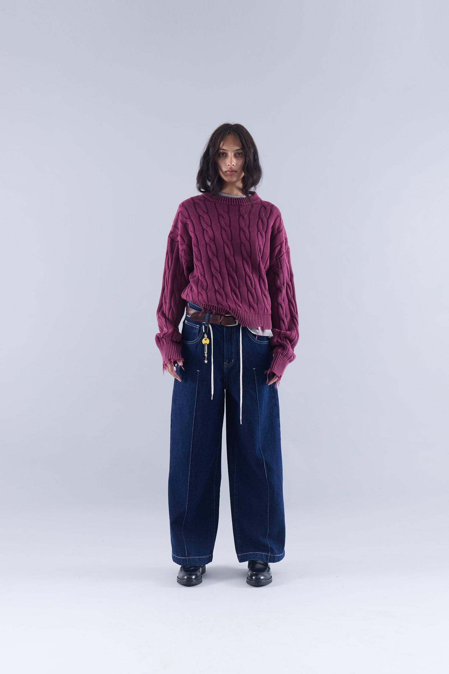 CABLE KNIT DISTRESSED SWEATER