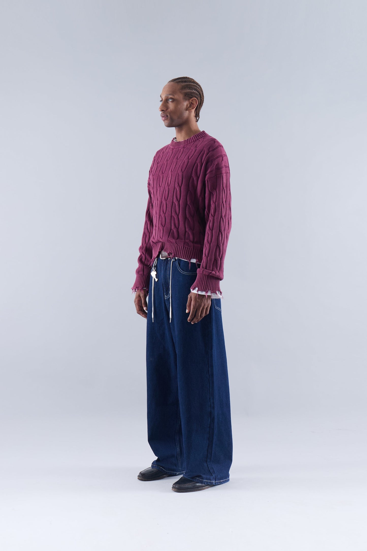 CABLE KNIT DISTRESSED SWEATER