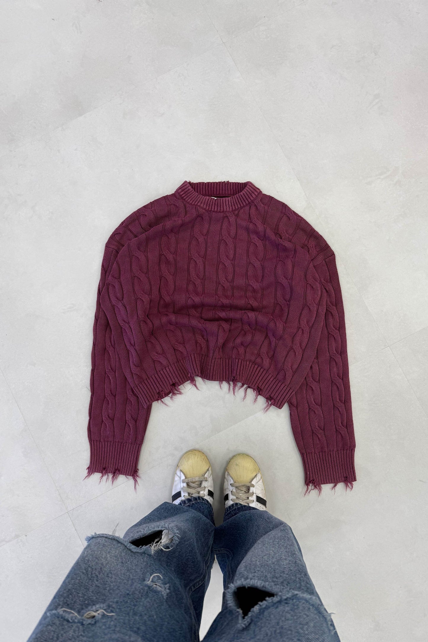 CABLE KNIT DISTRESSED SWEATER